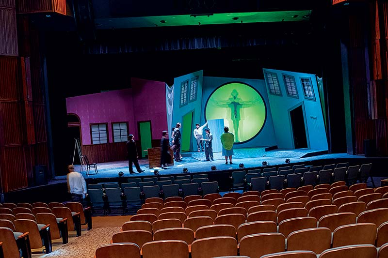 Student actors on stage