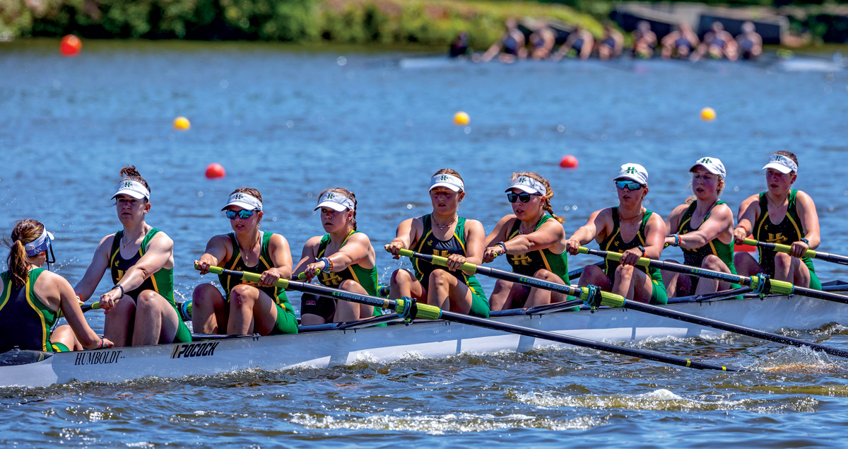 large group of rowers on the water