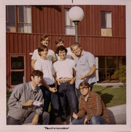 (Clockwise beginning from the bottom left): Craig Tucker, Tom Nannizzi, Steve Vittum, Steve Wiard, Scott Gordon, Craig Thurber, and Dave Beech in front of Maple Hall.