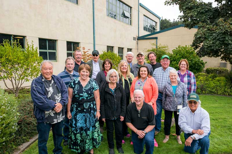 In 2018, when Craig Tucker (center back row) received his Distinguished Alumni award, the Maple Hall crew united and returned to Humboldt to honor their friend.